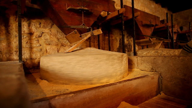 Traditional stone mill processing grains into flour, in Dalmatia, Croatia