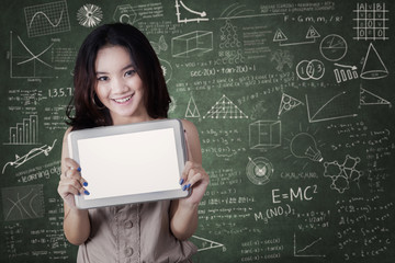 Female student shows blank tablet screen