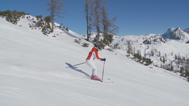 female skier on empty slope
