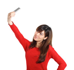 Naklejka premium Asian girl taking a selfie with her phone