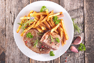 grilled steak and french fries