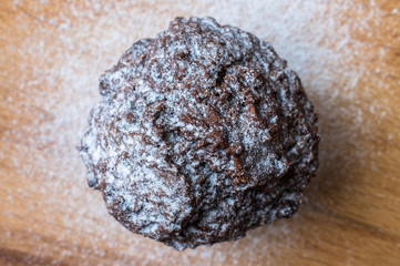 Muffin chocolate banana with powdered sugar