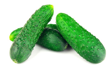 Fresh cucumbers, isolated on a white background.