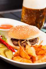 burger with mug of beer
