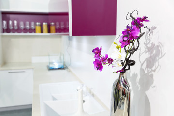 Nice kitchen interior with orchid flower