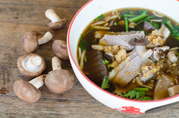 noodles with pot-stewed duck in bowl