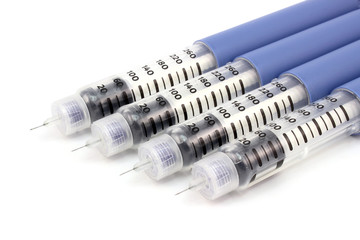 Four syringe pen with needles