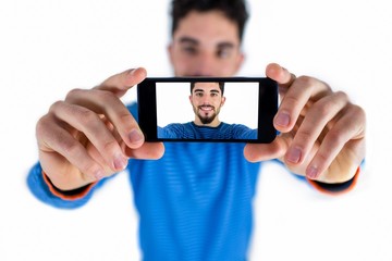 Casual man taking a selfie