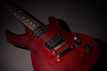 Fototapeta na wymiar Electric guitar on a dark background