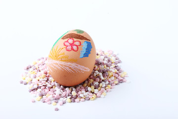 Easter egg put on colorful pretty candy