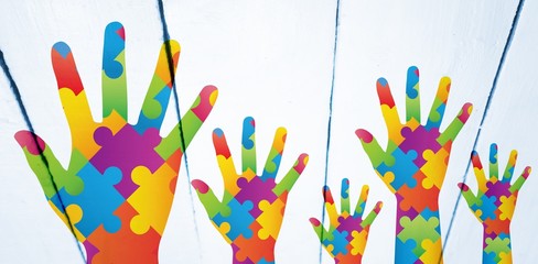 Composite image of autism awareness hand - Powered by Adobe