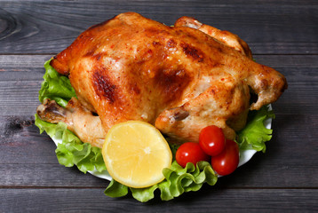 baked fried chicken carcass with vegetables