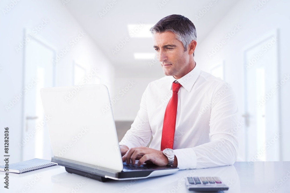Poster composite image of businessman using laptop