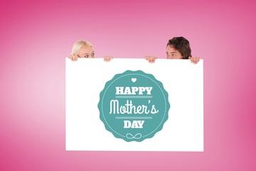 Composite image of happy couple hiding