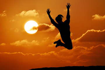 Happy girl woman jump against beautiful sunset. Freedom - 81282697