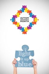 Composite image of hands showing jigsaw puzzle