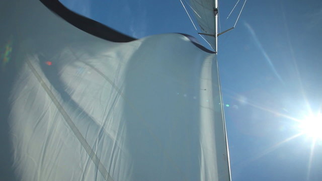 Sail floating in the wind on a beautiful sailboat