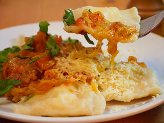 Ravioli with tomato sauce closeup