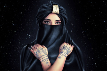 beautiful stylish woman in oriental style in turban