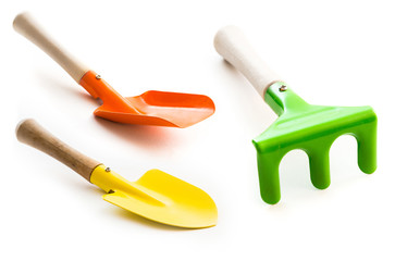 three gardening tools on a white background