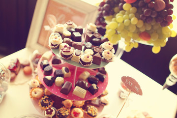 Delicious mix of sweets on table