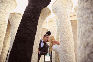 Bride and groom kissing