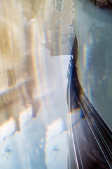Detail of gondola with reflections in water © olgasyrova