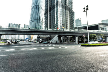 Fototapeta na wymiar urban road and modern buildings in city