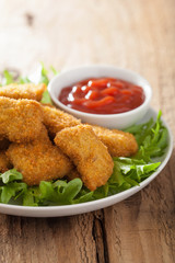 chicken nuggets with ketchup