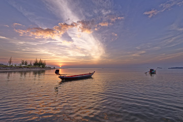 Boat at sunset in tropical Thailand