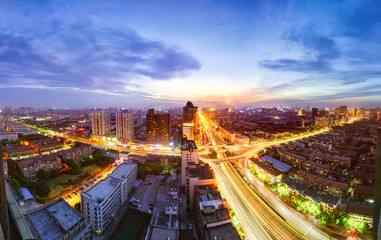 night view of the bridge and city in shanghai china.