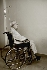 Old man sitting in a wheelchair