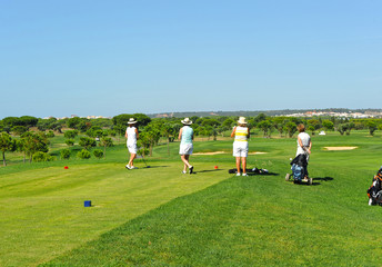 Group of women friends playing golf, Spain