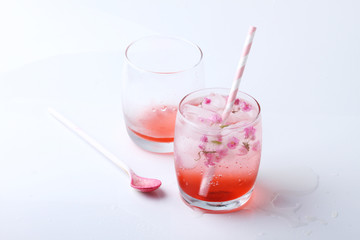 two glass of flower soda drinks
