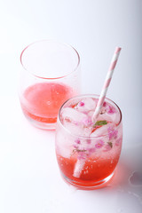 two glass of flower soda drinks
