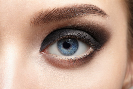 Closeup of beautiful woman eye with makeup, eyeliner