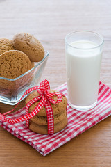 Oatmeal cookies and a glass of milk