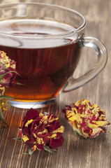 Cup of tea and dry roses