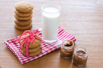 Oatmeal cookies and a glass of milk