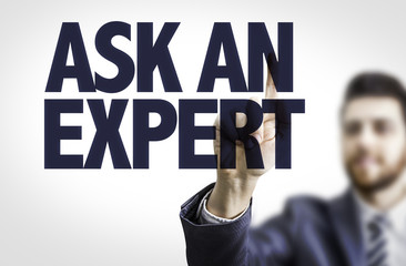 Business man pointing the text: Ask An Expert