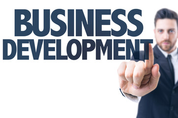 Business man pointing the text: Business Development