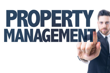 Business man pointing the text: Property Management