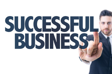 Business man pointing the text: Successful Business