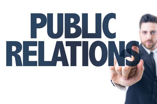 Business man pointing the text: Public Relations