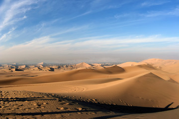 Fototapeta na wymiar Sand dunes in Pisco desert, Peru