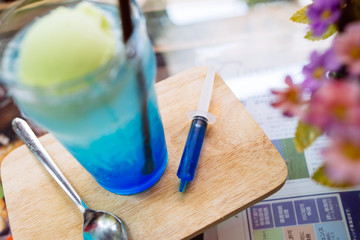 blue sweet syringe drink