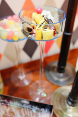Multicolored candies in glass