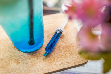 blue sweet syringe drink