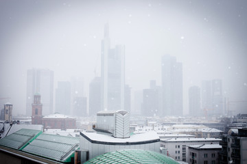 Fototapeta na wymiar Frankfurt am Main, winter, snowfall, skyline, city