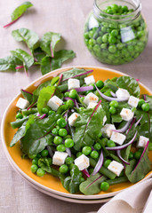 Salad with green peas, beans, red onion and feta cheese